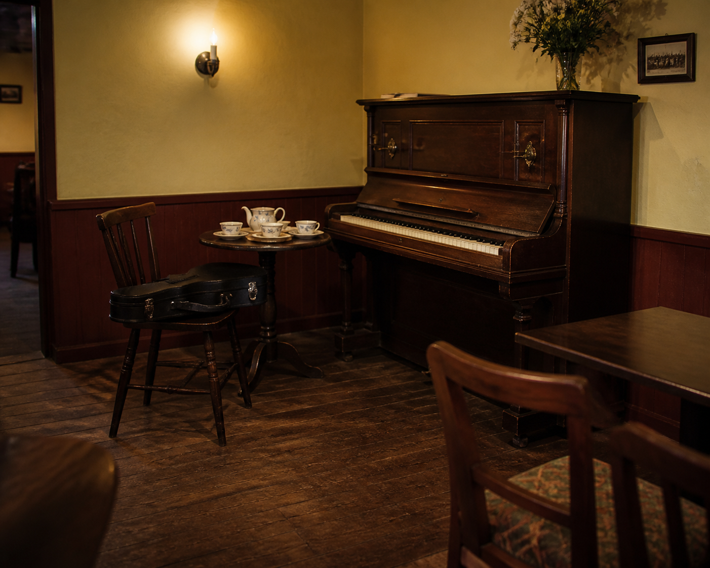Piano and fiddle case in a function room